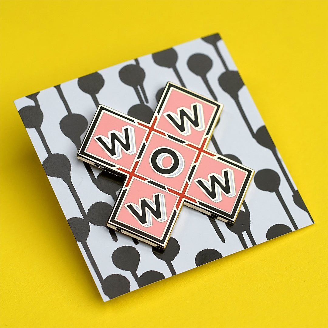 WOW enamel pin designed by Archie Proudfoot
